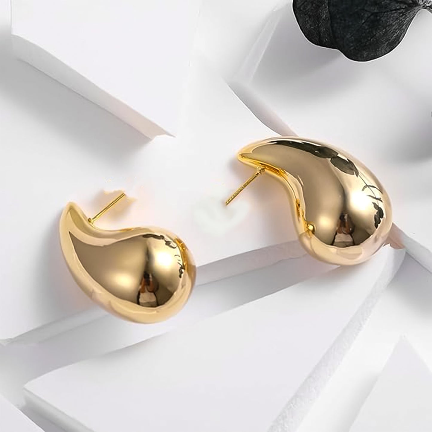 Kaju Design Earrings captured from a unique angle, emphasizing their elegant form.