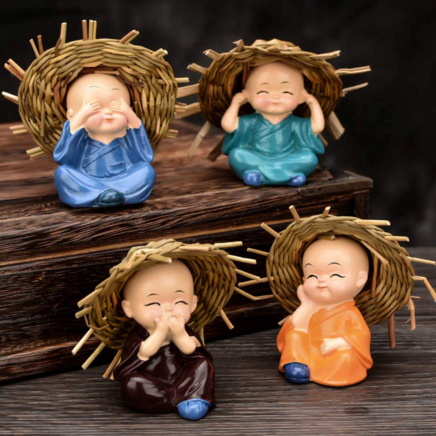 Decorative Resin Monk Buddha Showpiece Set of 4 with Traditional Straw Hats