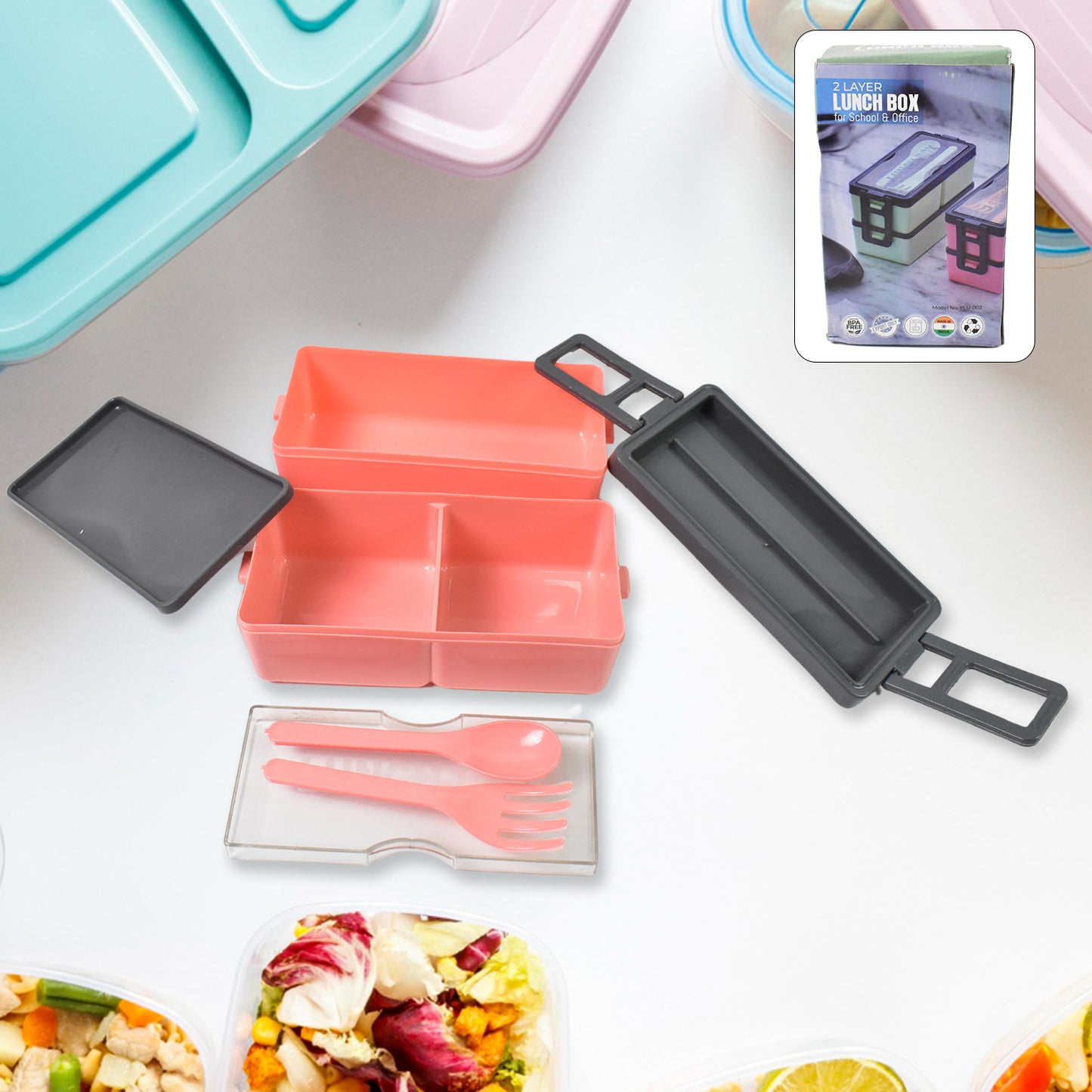 Blue 2-layer lunch box with spoon and fork, ideal for office professionals.