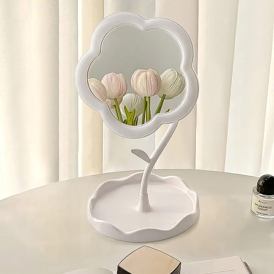 Flower-shaped makeup mirror with a clear reflection and storage tray