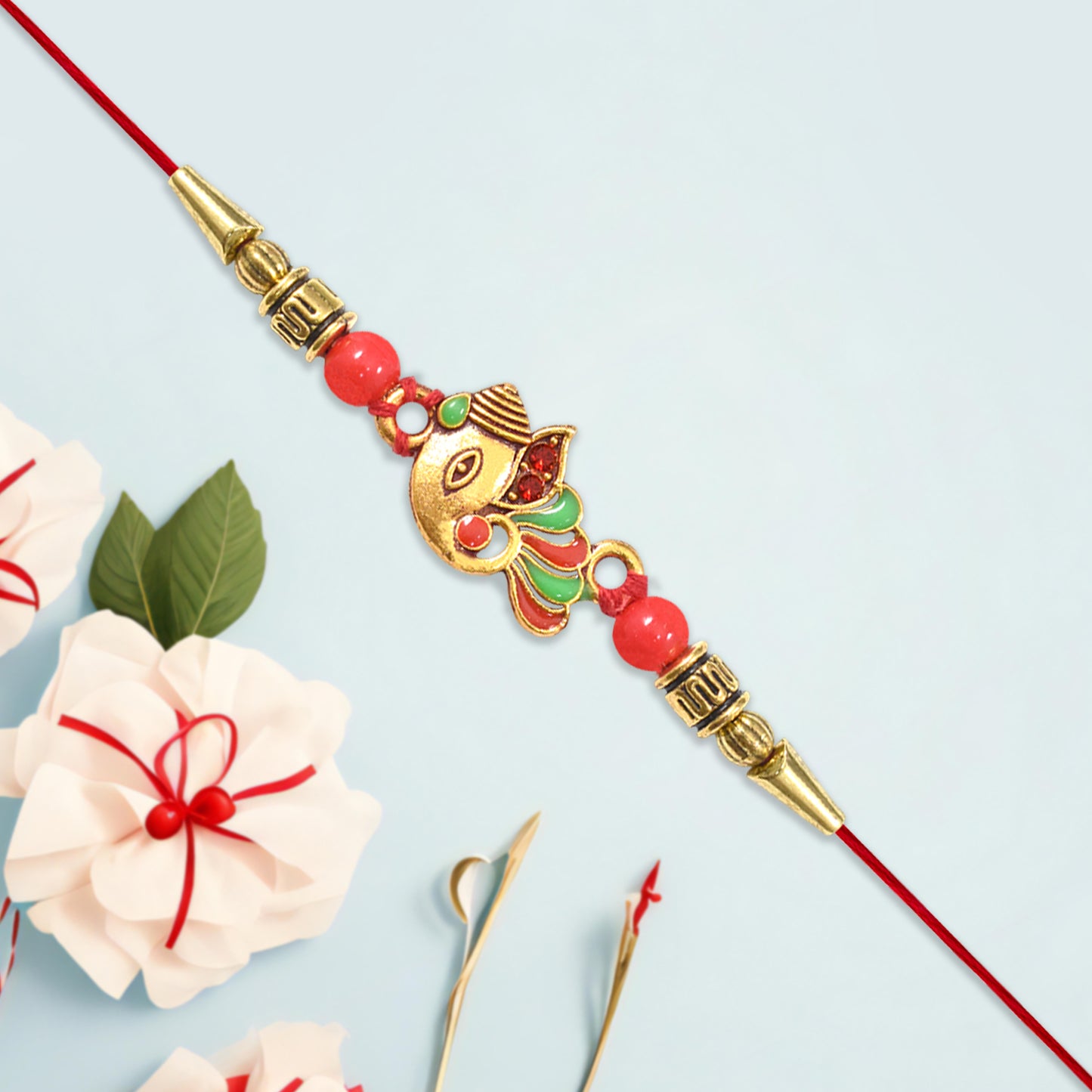 Ganpati Rakhi Blessing for Her Brother’s Success