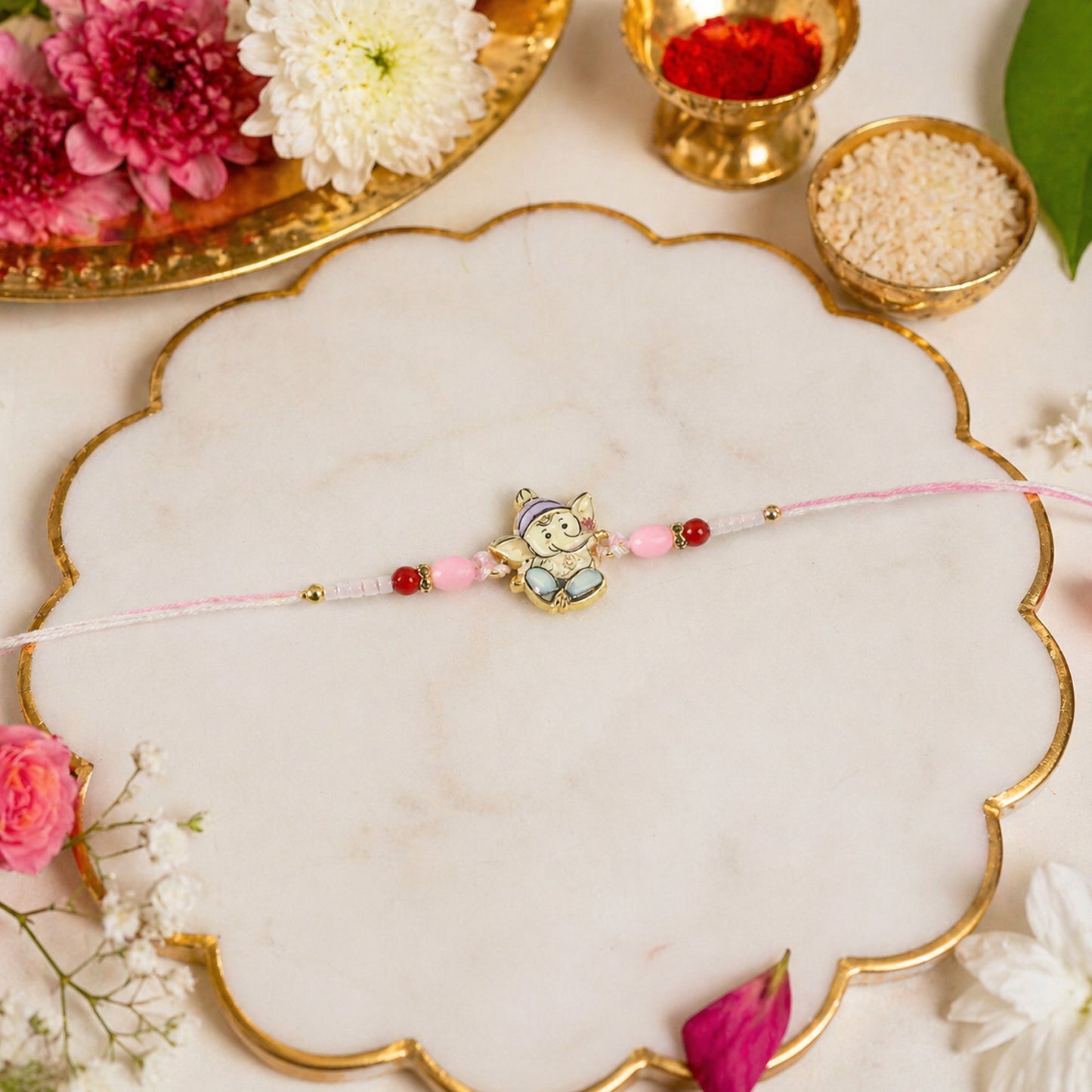 Cute Ganesha Designer Rakhi with Pink and Red Beads (1 Pc)