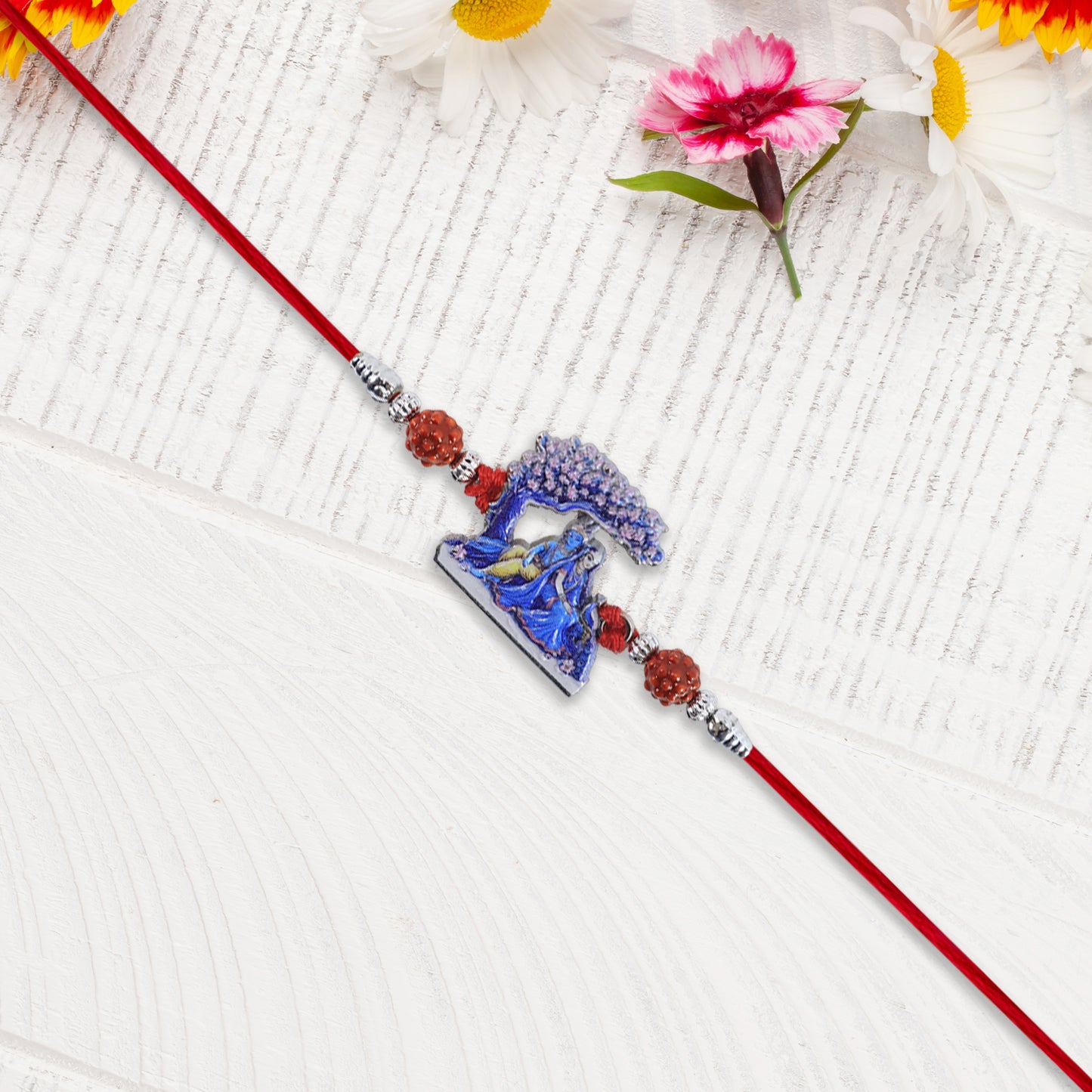 Radha Krishna Rakhi under Tree Design with Rudraksha & Red Mauli Thread
