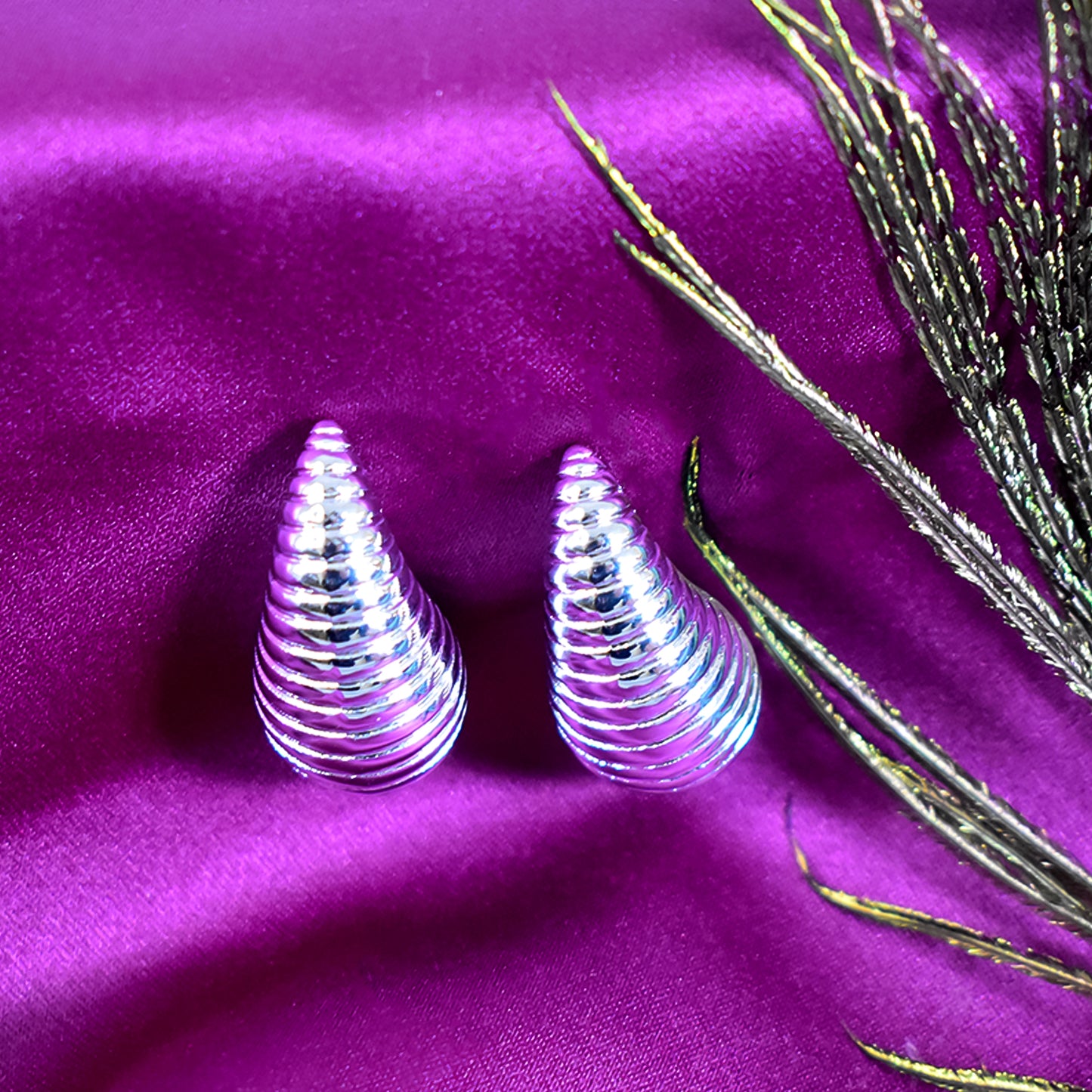 Another angle of the beautiful Kaju earrings, highlighting their unique traditional Indian design.