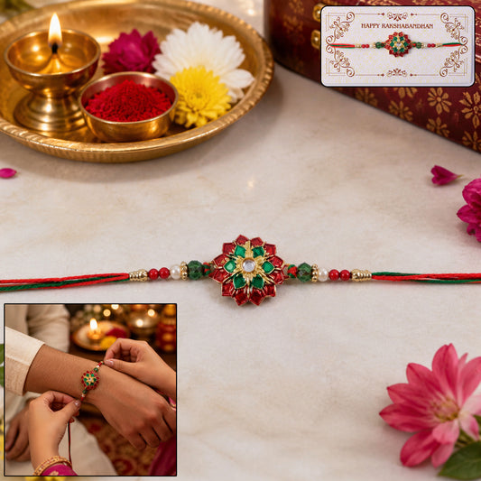 Traditional Rakhi with floral stone centerpiece and red green thread