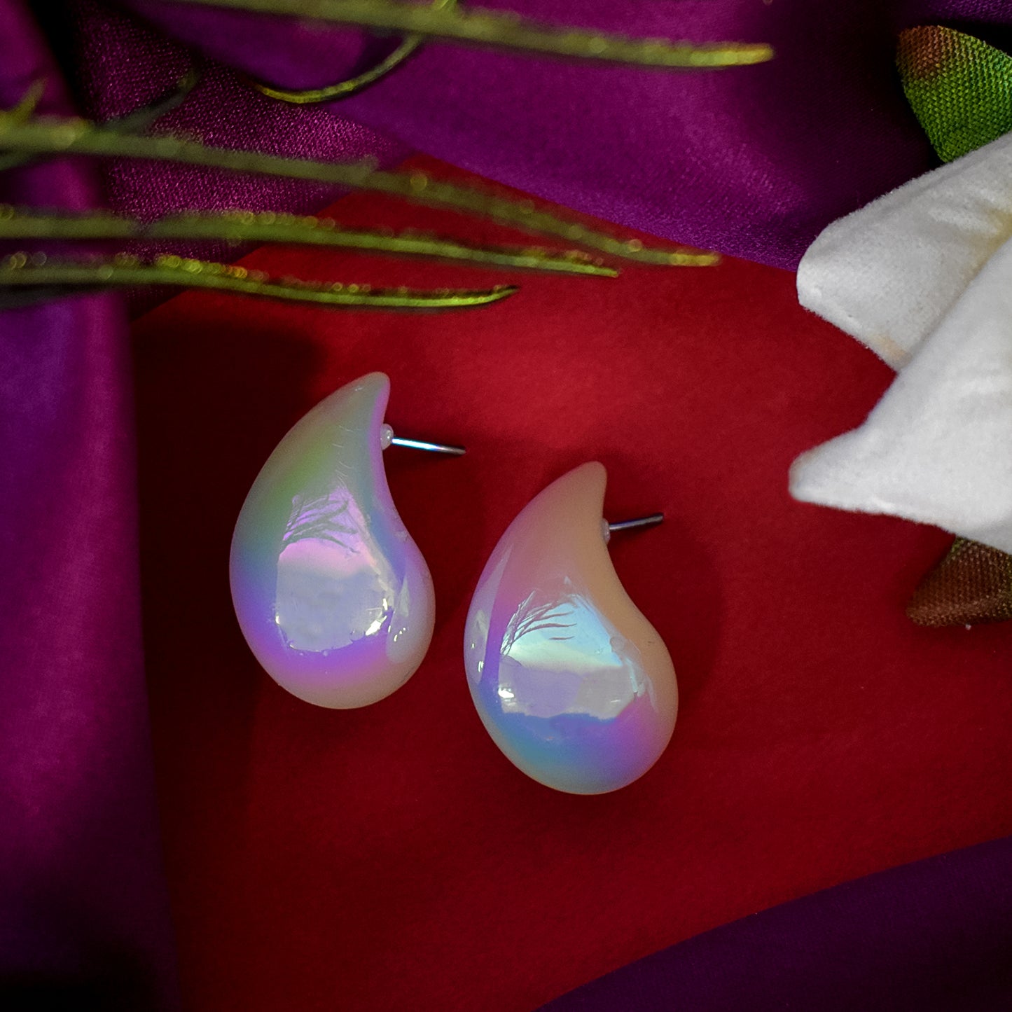 Stylish Kaju Design Earrings with a radiant finish, presented against a minimalist backdrop.
