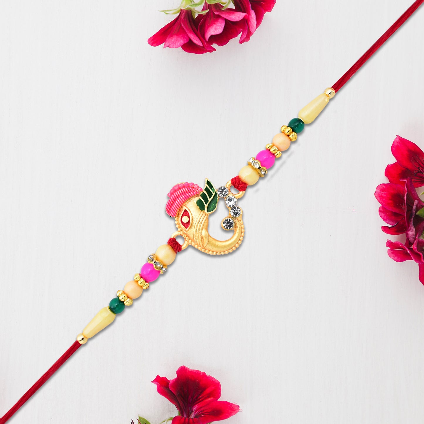 Stylish Ganesh Design Rakhi with Multicolor Beads and Gold Finish Accents