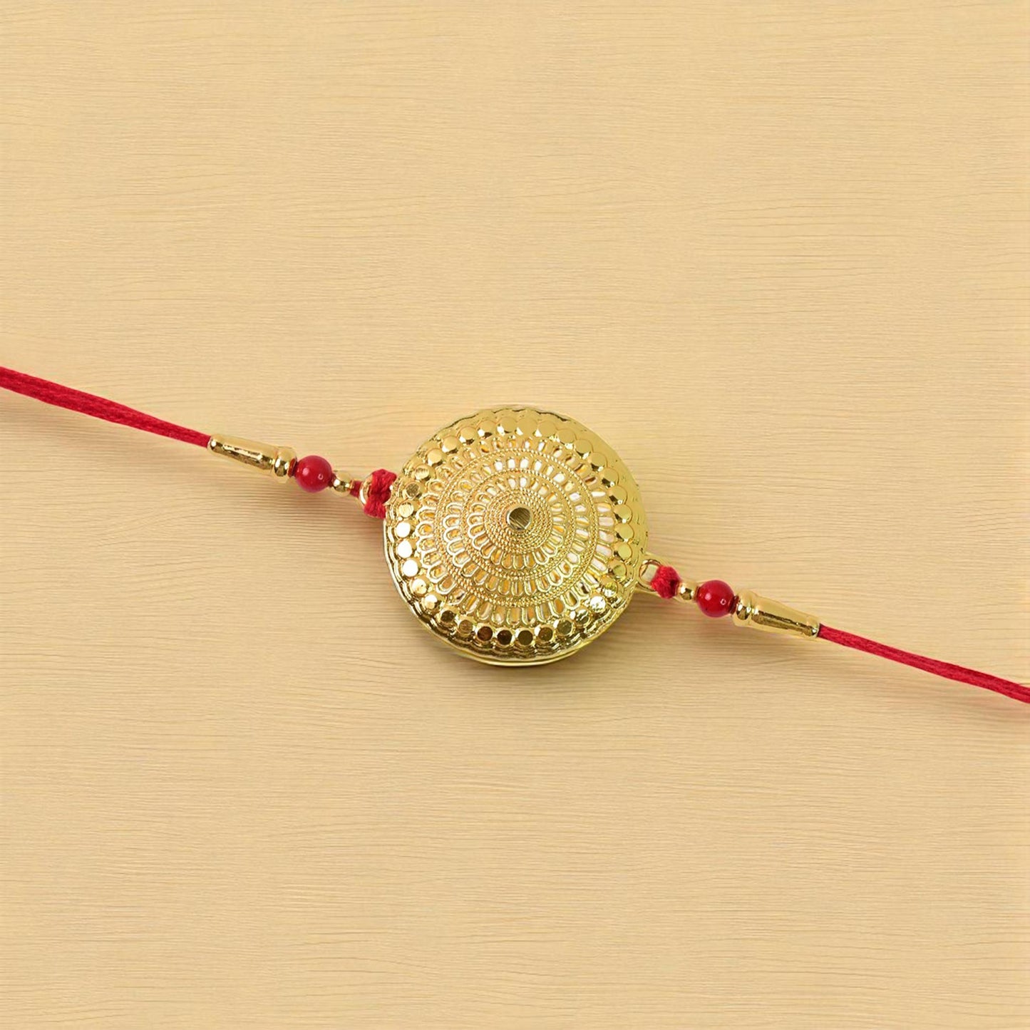 Variety of gold accent rakhis in the festive Raksha Bandhan set for brothers