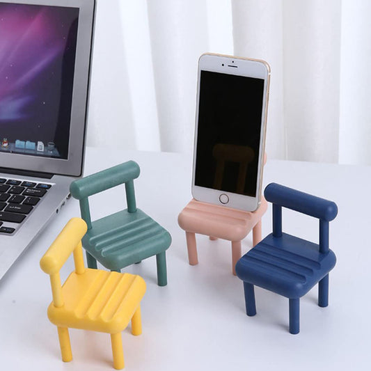 A charming Mini Chair Phone Holder crafted from light wood, showcasing its unique design.