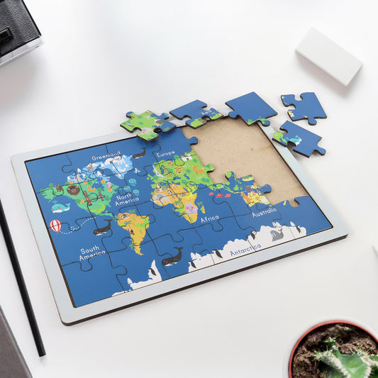 Completed wooden world map puzzle showing continents and animals