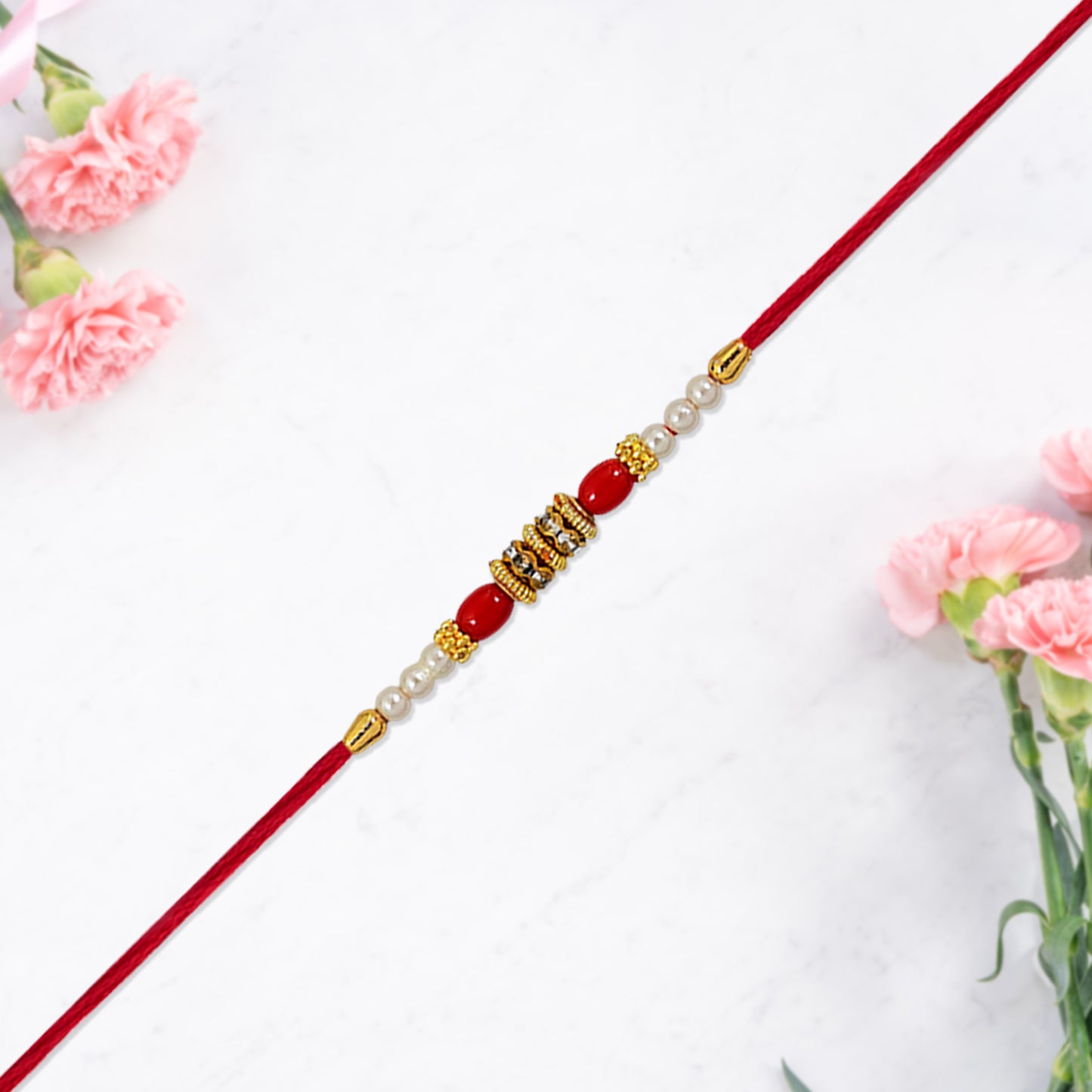 Traditional Pearl Beaded Rakhi with Red Beads & Golden Accents (1 Pc)