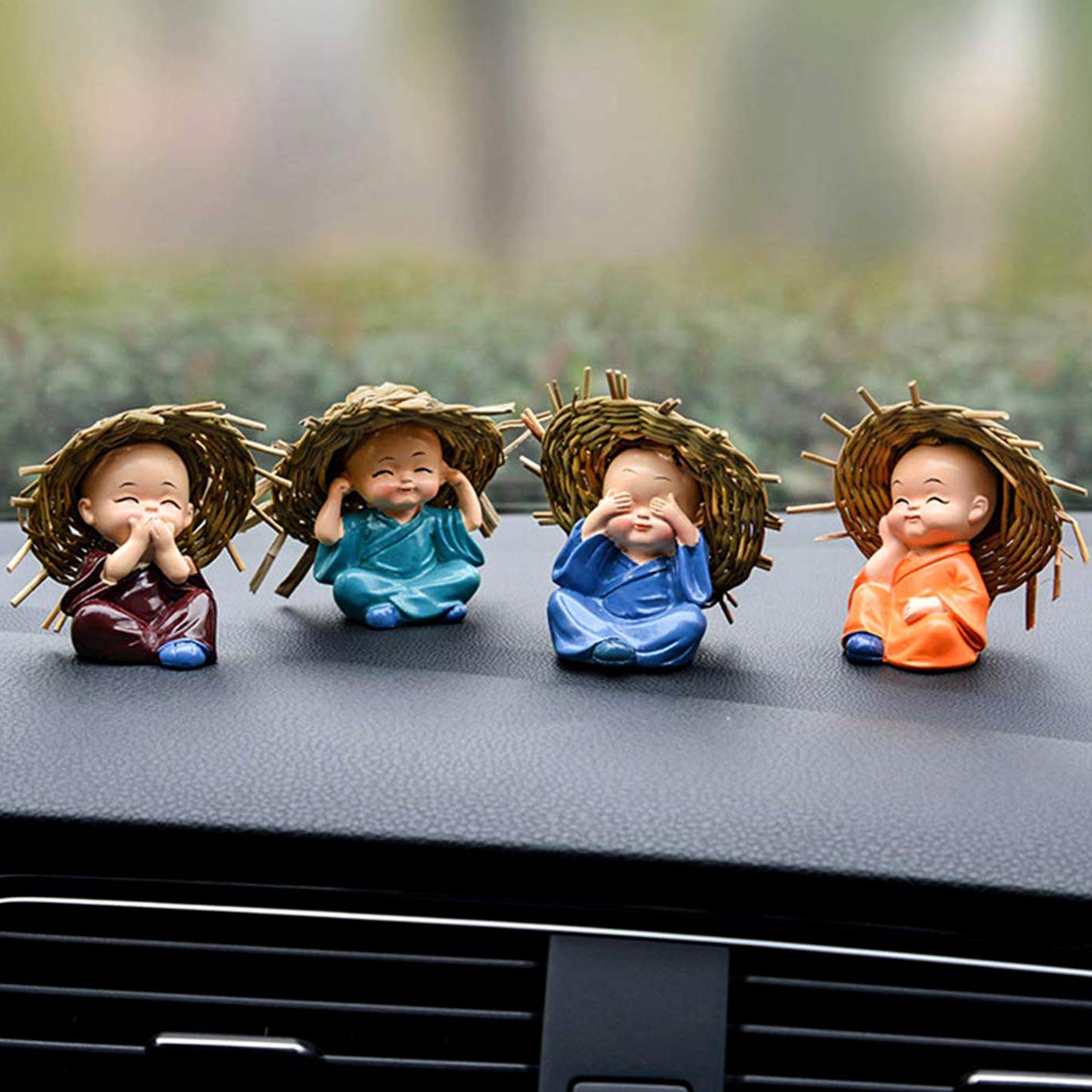 Decorative Resin Monk Buddha Showpiece Set of 4 with Traditional Straw Hats