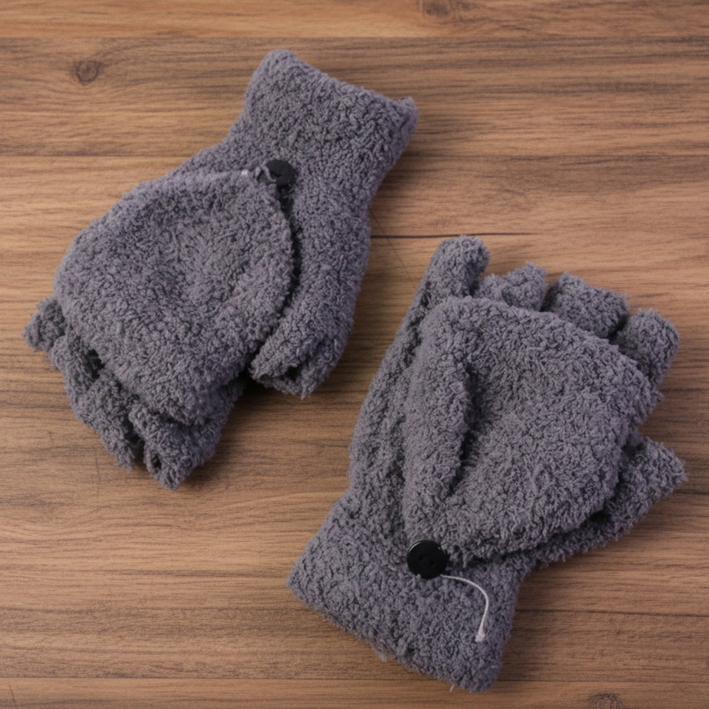 Hand gloves with button flap cover