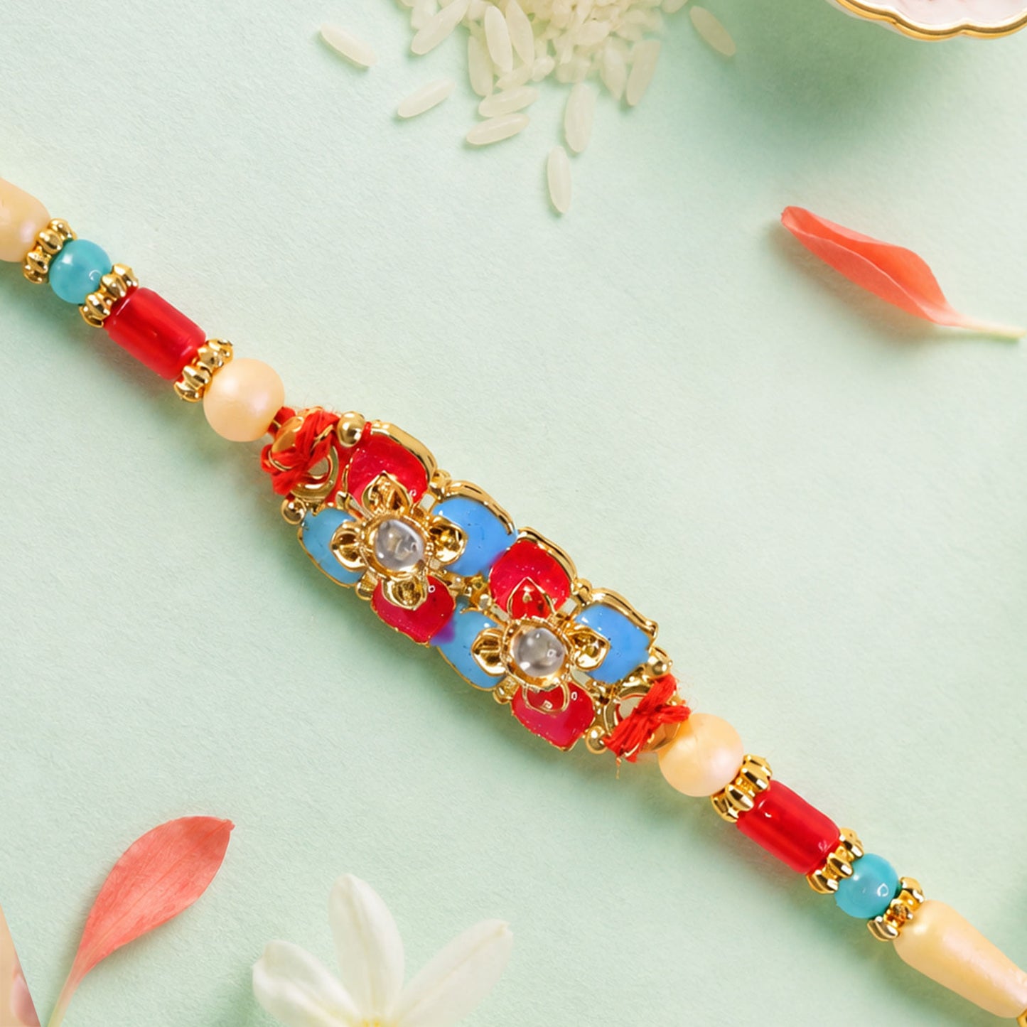 Multicolor Floral Kundan Pendant Rakhi with Red and Blue Beads