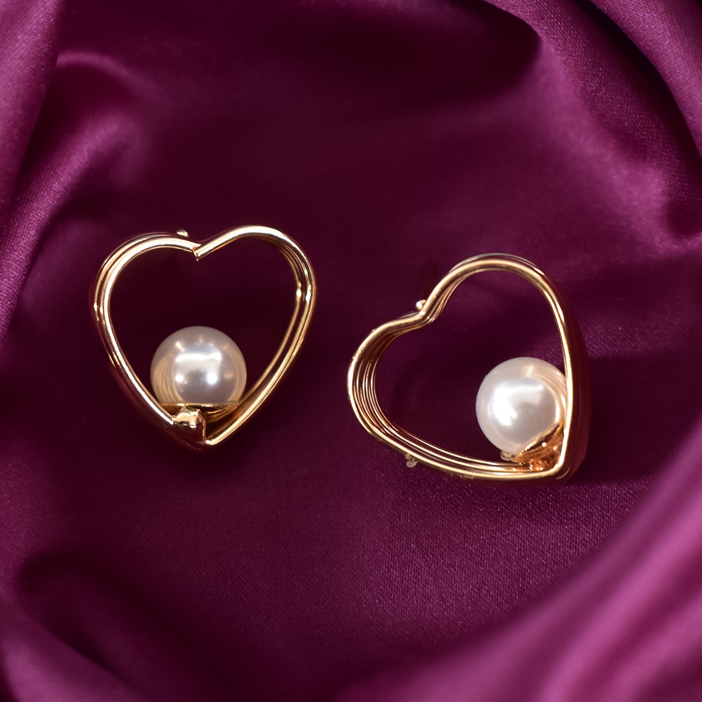 Detailed view of dazzling small hoop earrings with brilliant accents from the HV set.