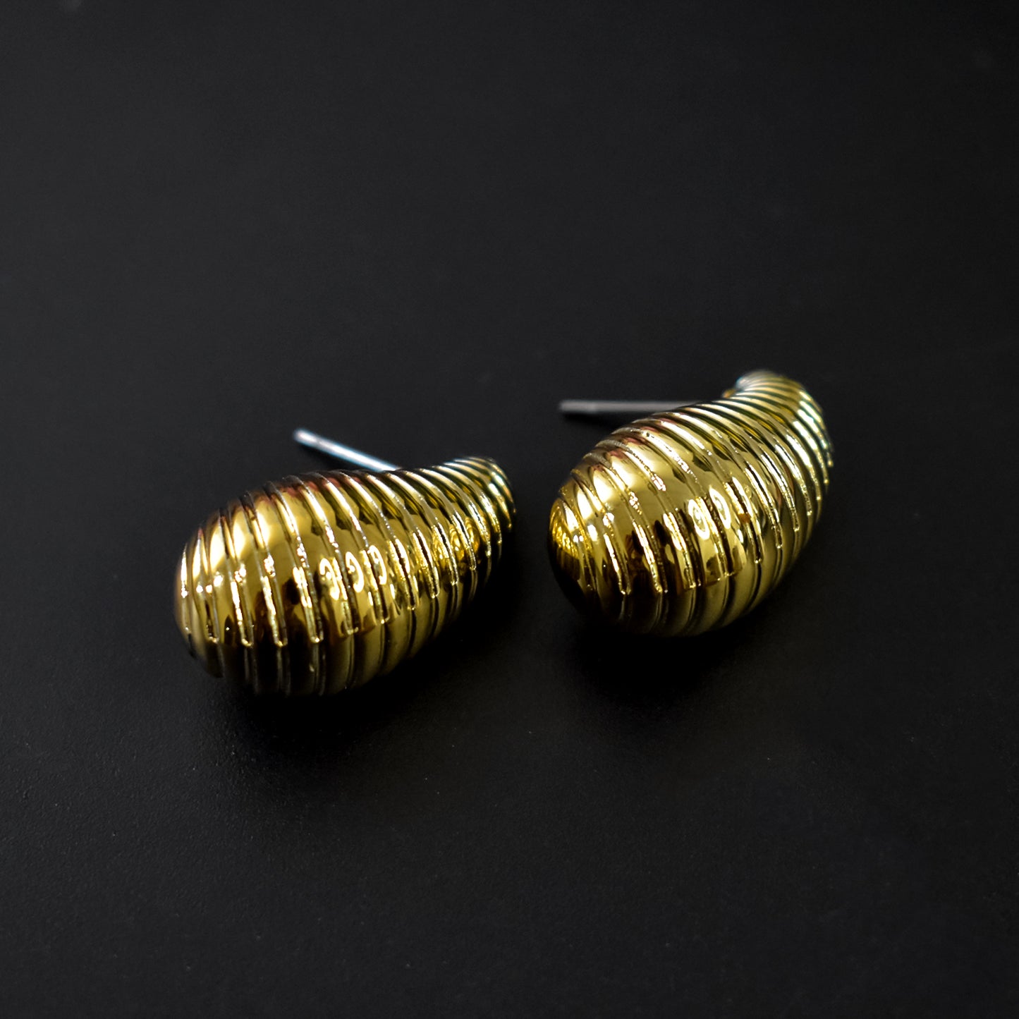 Close-up of the intricate Kaju Shape Earrings design, showcasing craftsmanship.