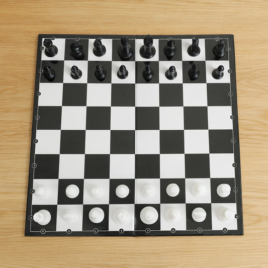 Player moving white chess piece on classic chess board during game