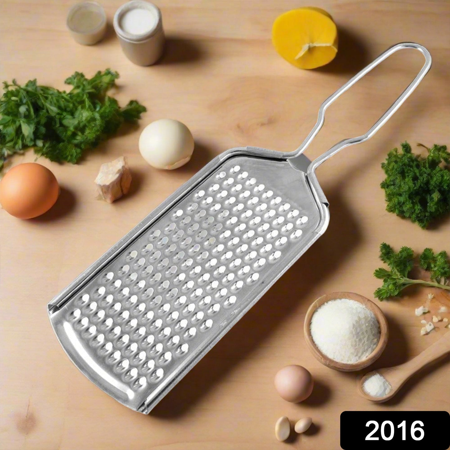 Grater held in hand showing size