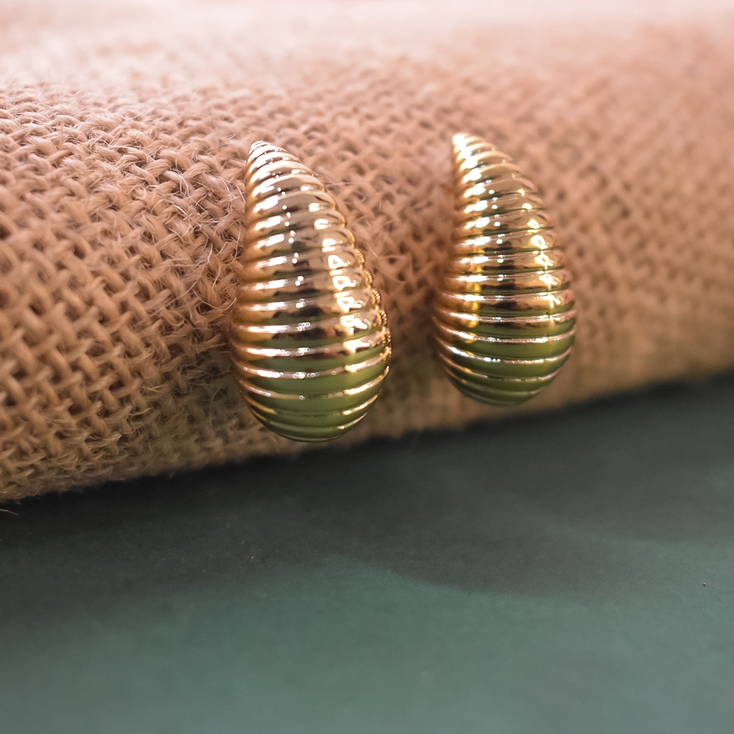 Woman wearing stylish Kaju Shape Earrings, adding a touch of sophistication.