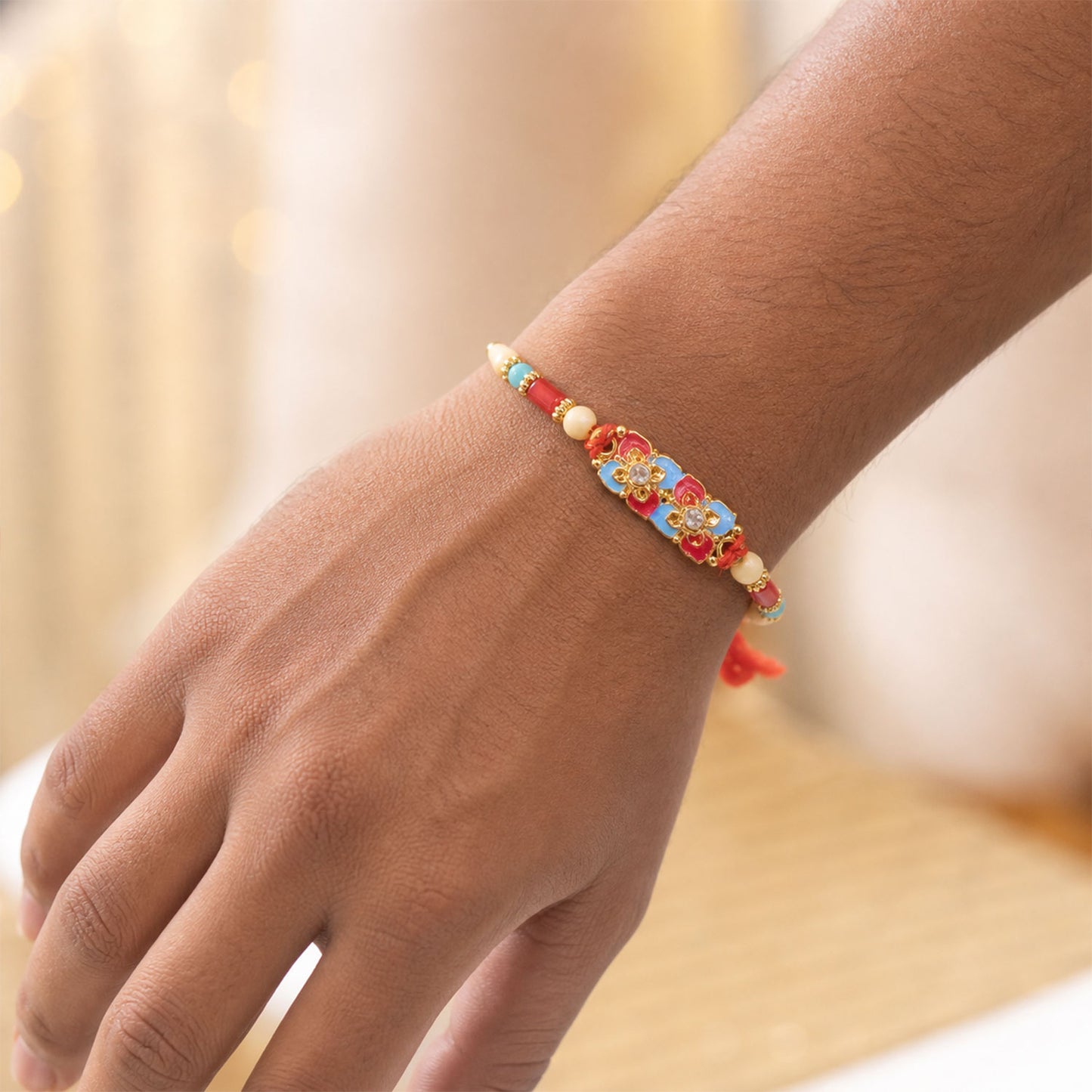Multicolor Floral Kundan Pendant Rakhi with Red and Blue Beads
