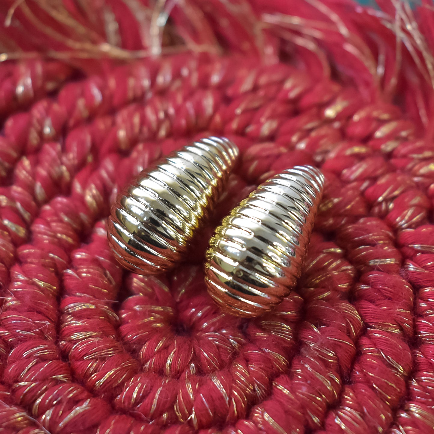 Back view of the Kaju Shape Earrings, highlighting their comfortable fit.