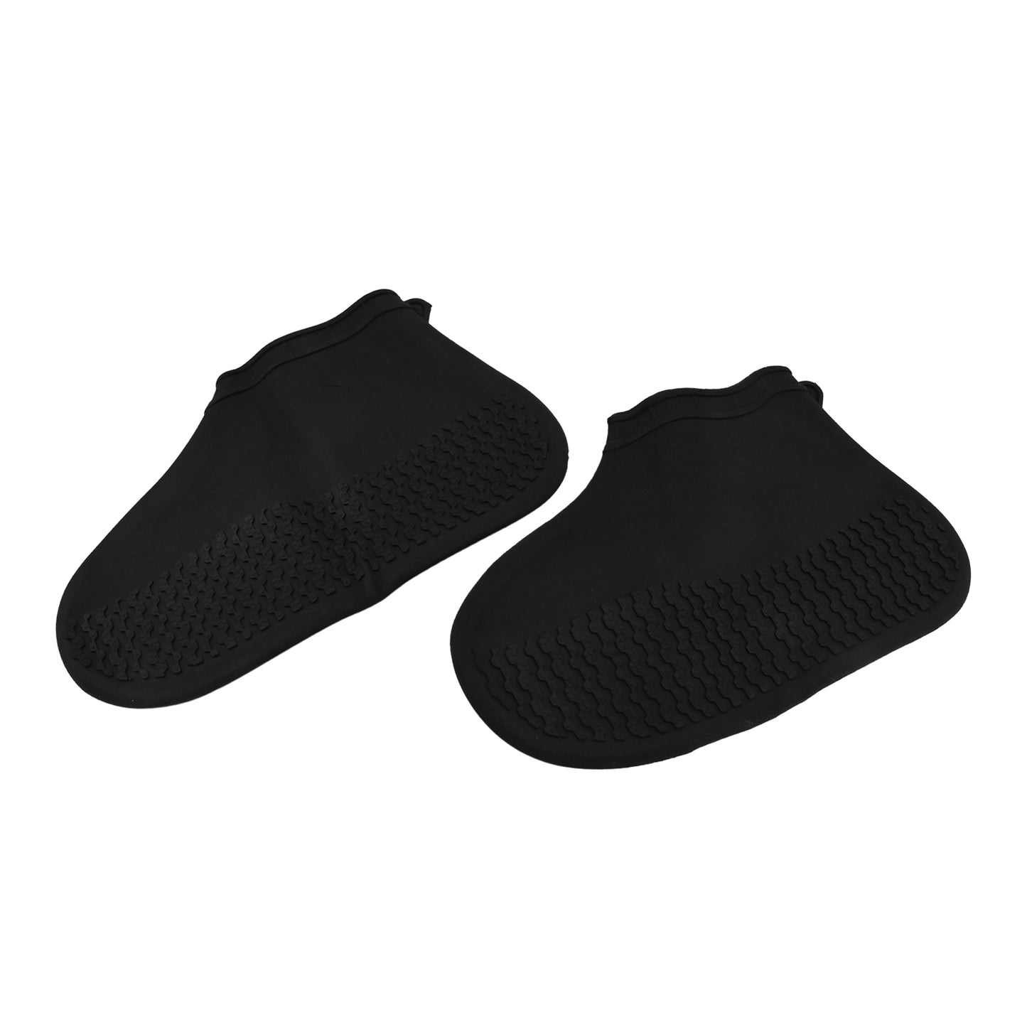 Folded silicone shoe cover showing compact size