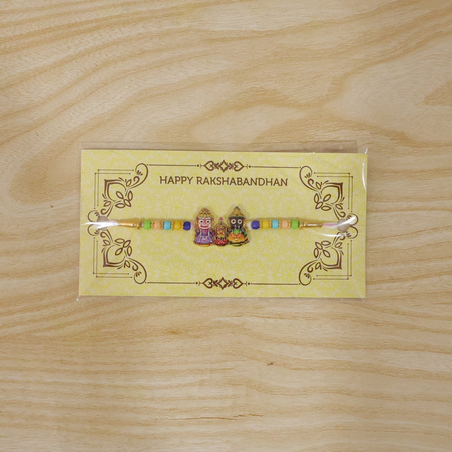 Colorful beads strand on designer Rakhi