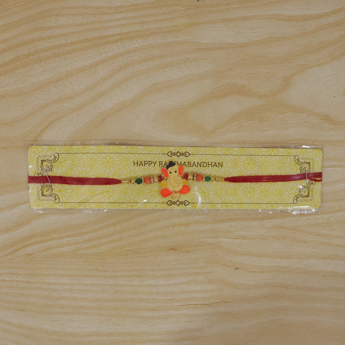Lord Ganesha Rakhi with vibrant beads and soft thread