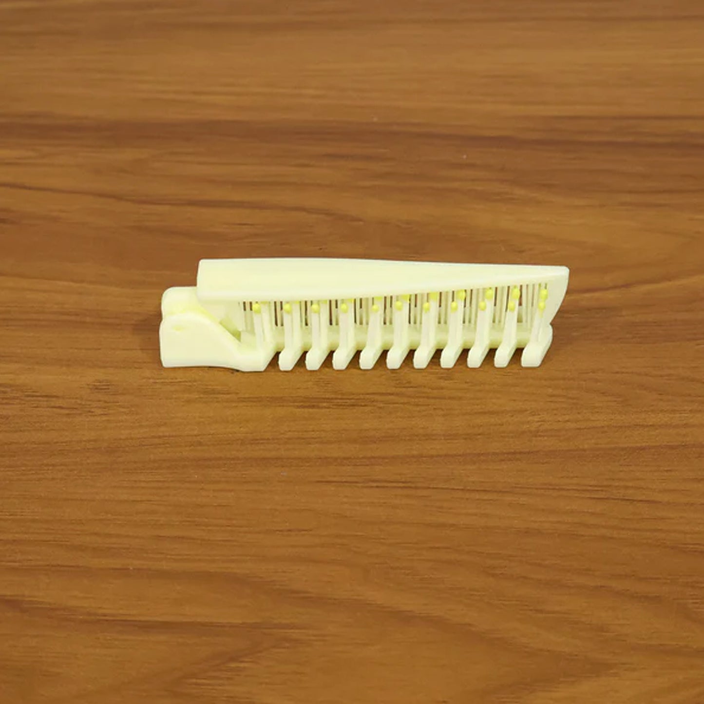 Foldable 2-in-1 hair comb & brush, open, ready for use