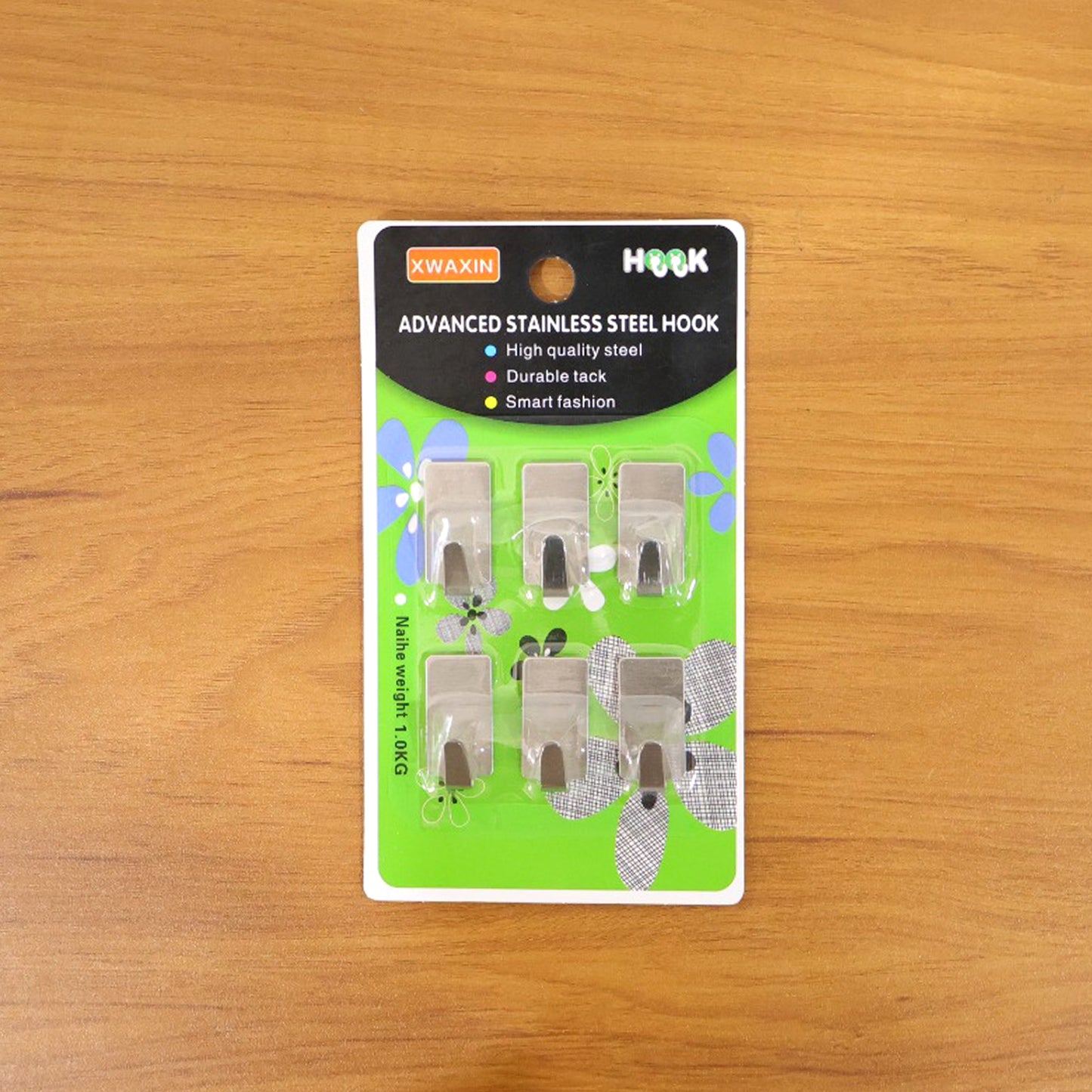 Individual adhesive wall hook on display
