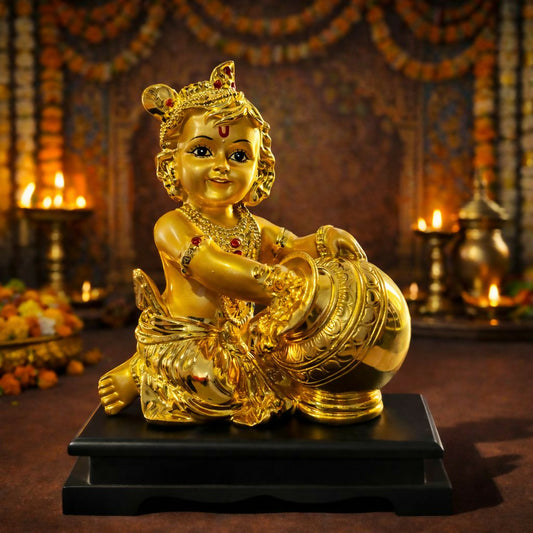 Bal Krishna idol holding butter pot with golden finish