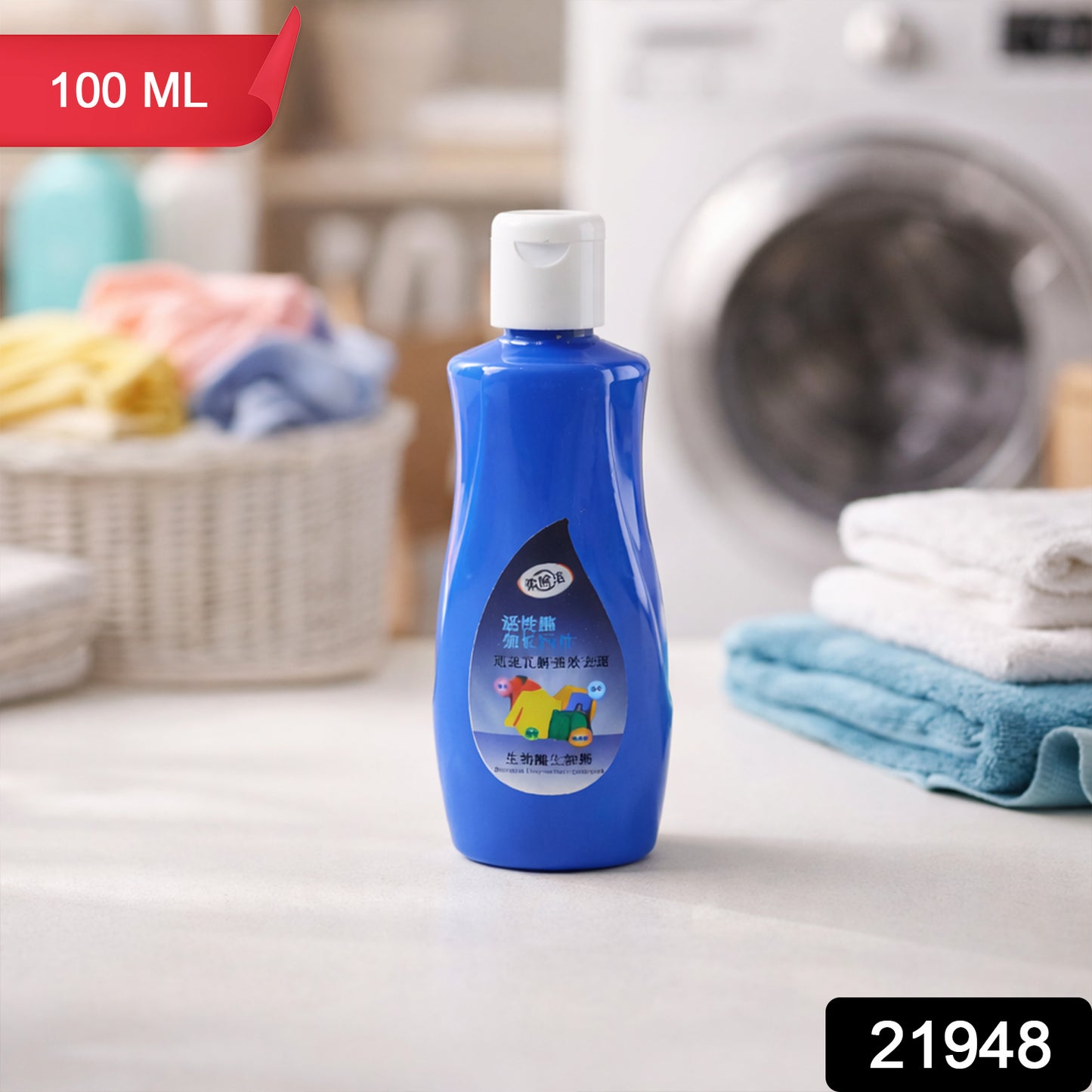 Laundry stain remover liquid applied on fabric