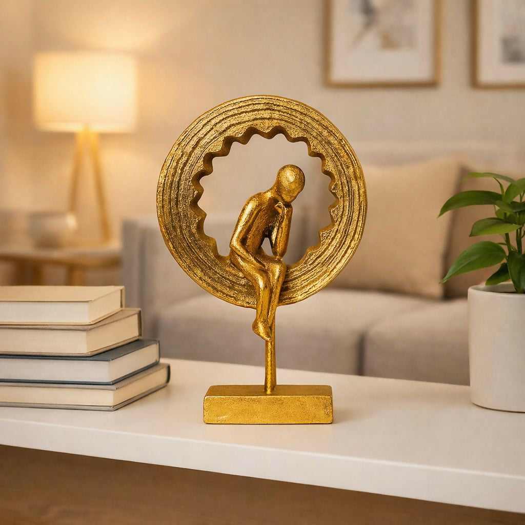 Abstract thinking man gold sculpture front view