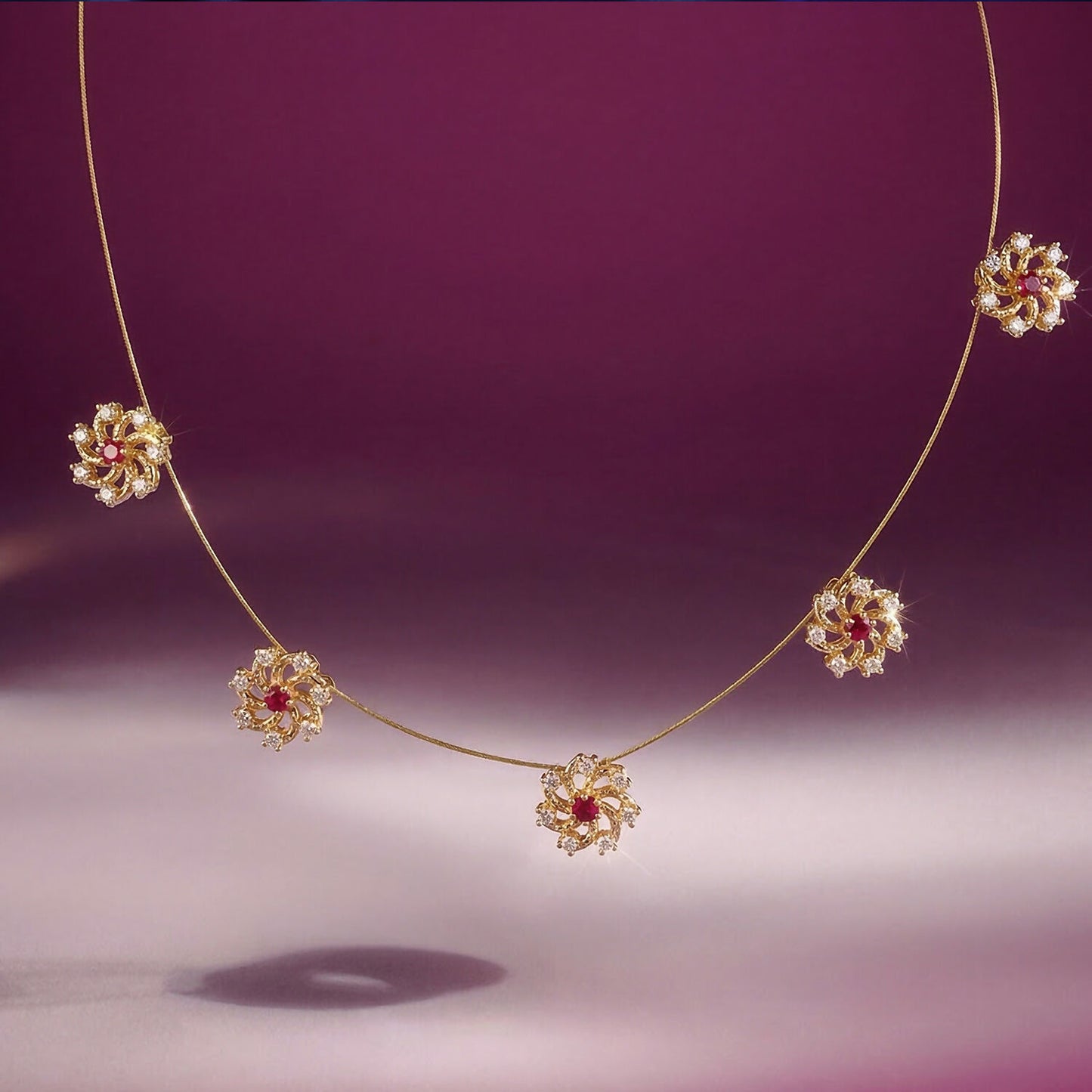 Ruby Floral Station Necklace with Diamond Detailing and Elegant Gold Chain Design