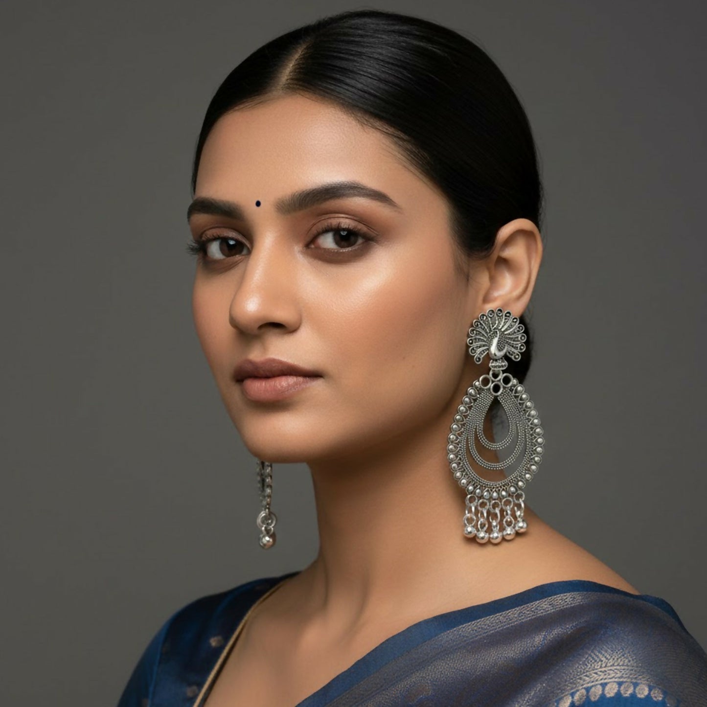 Elegant Peacock Inspired Silver Finish Jhumka Earings