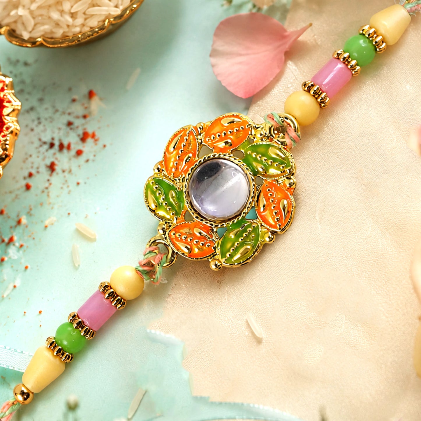Gold Leaf Kundan Pendant Rakhi with Rudraksha Beads