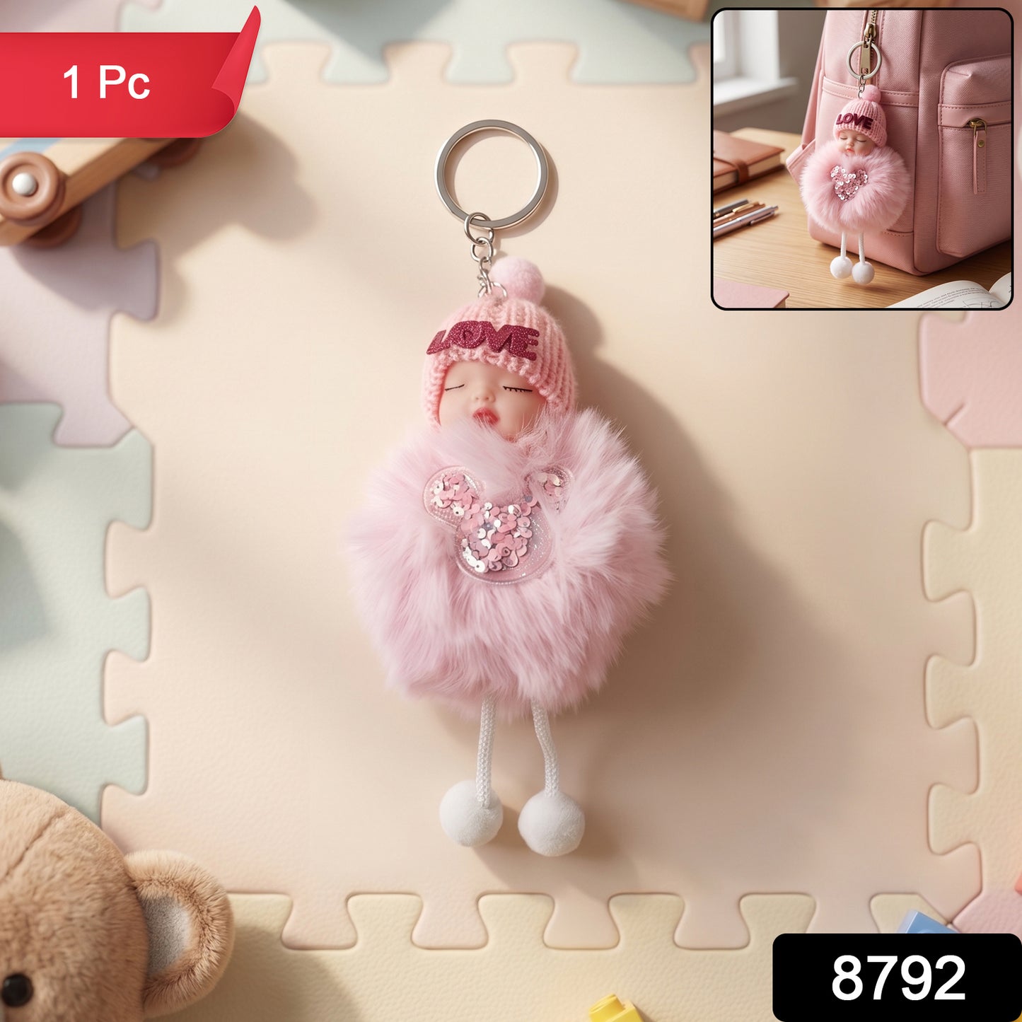 Close-up of the soft plush doll and fur ball keychain