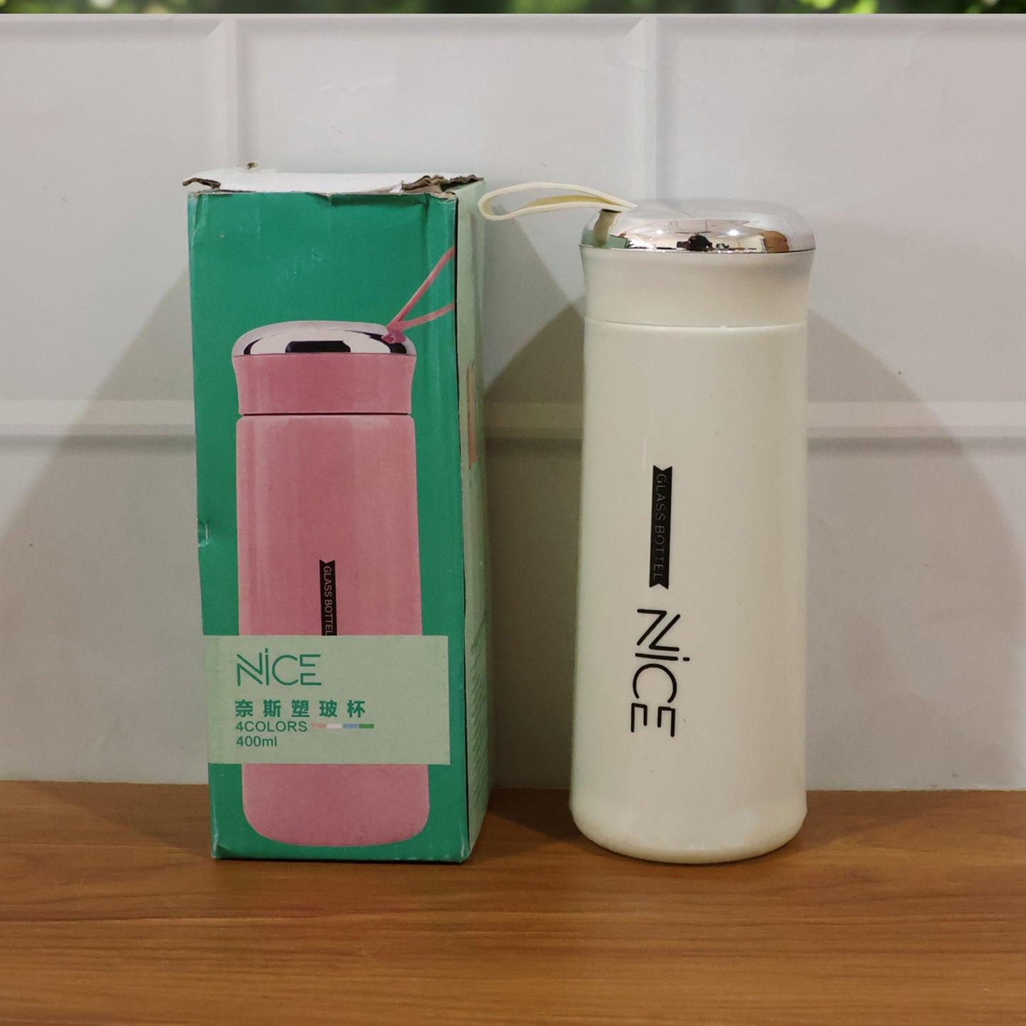 Compact 400 ML white glass water bottle