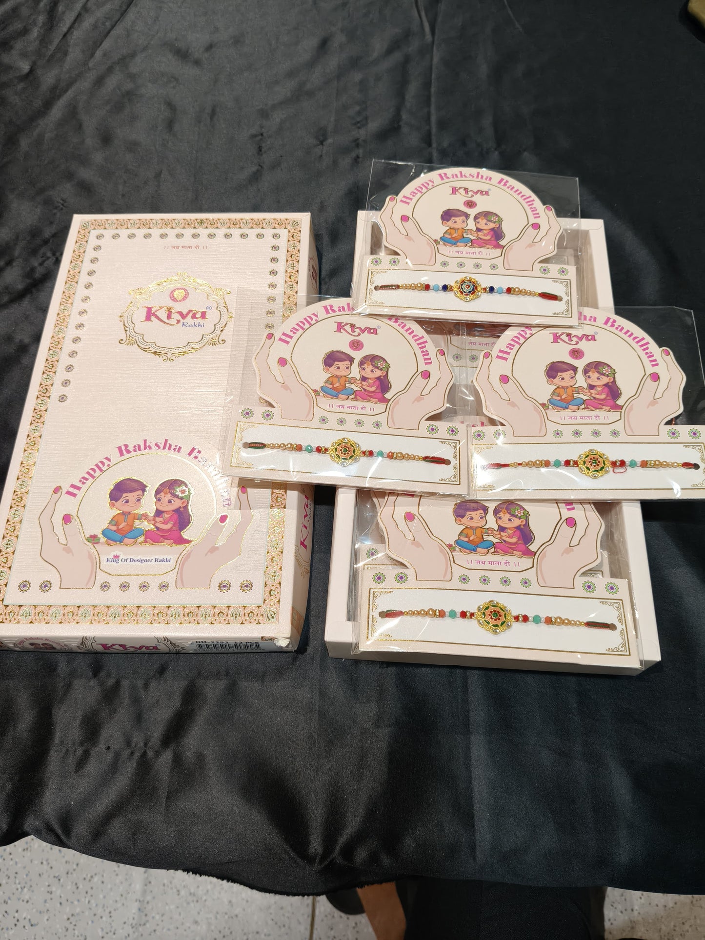 Magnificent Set of Twelve Red-Threaded Rakhis with Golden Embellishments
