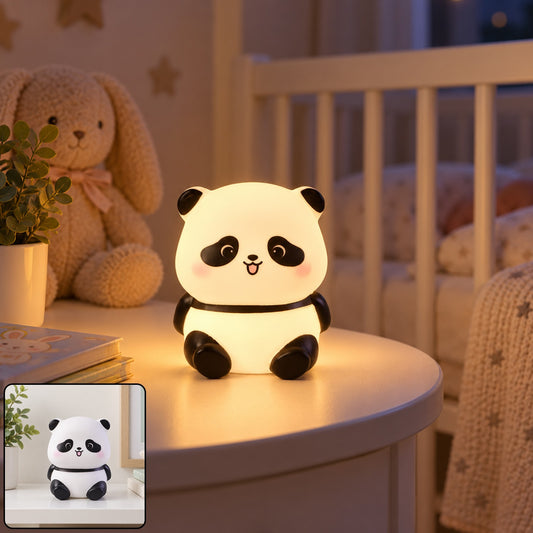 A glowing panda night light with a happy face sits on a white bedside table in a child's room.