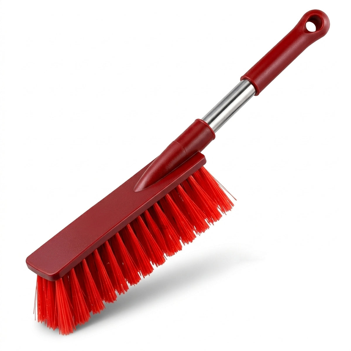 A red and silver extendable cleaning brush with vibrant red bristles is angled on a white background.