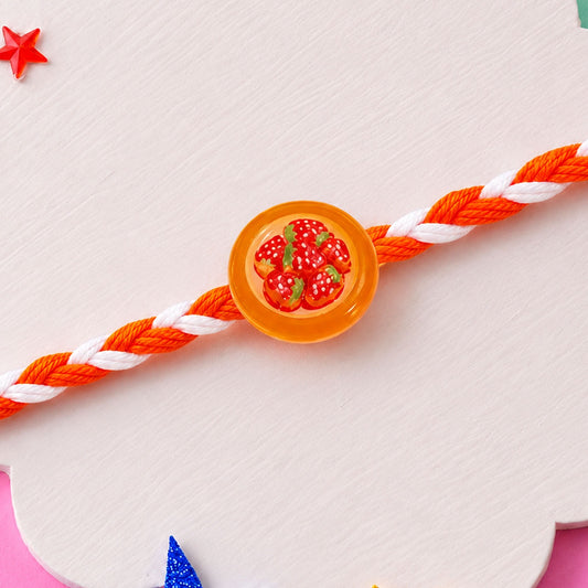 Strawberry Dori Rakhi with a vibrant strawberry design for brothers