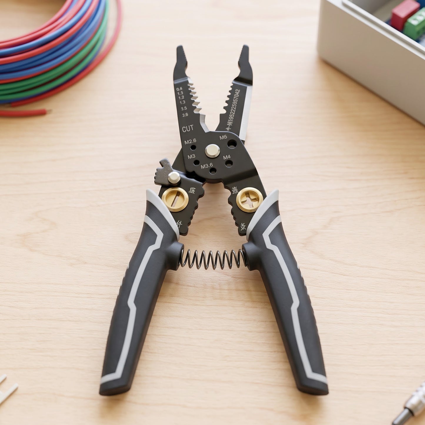 Handheld wire stripper and crimper