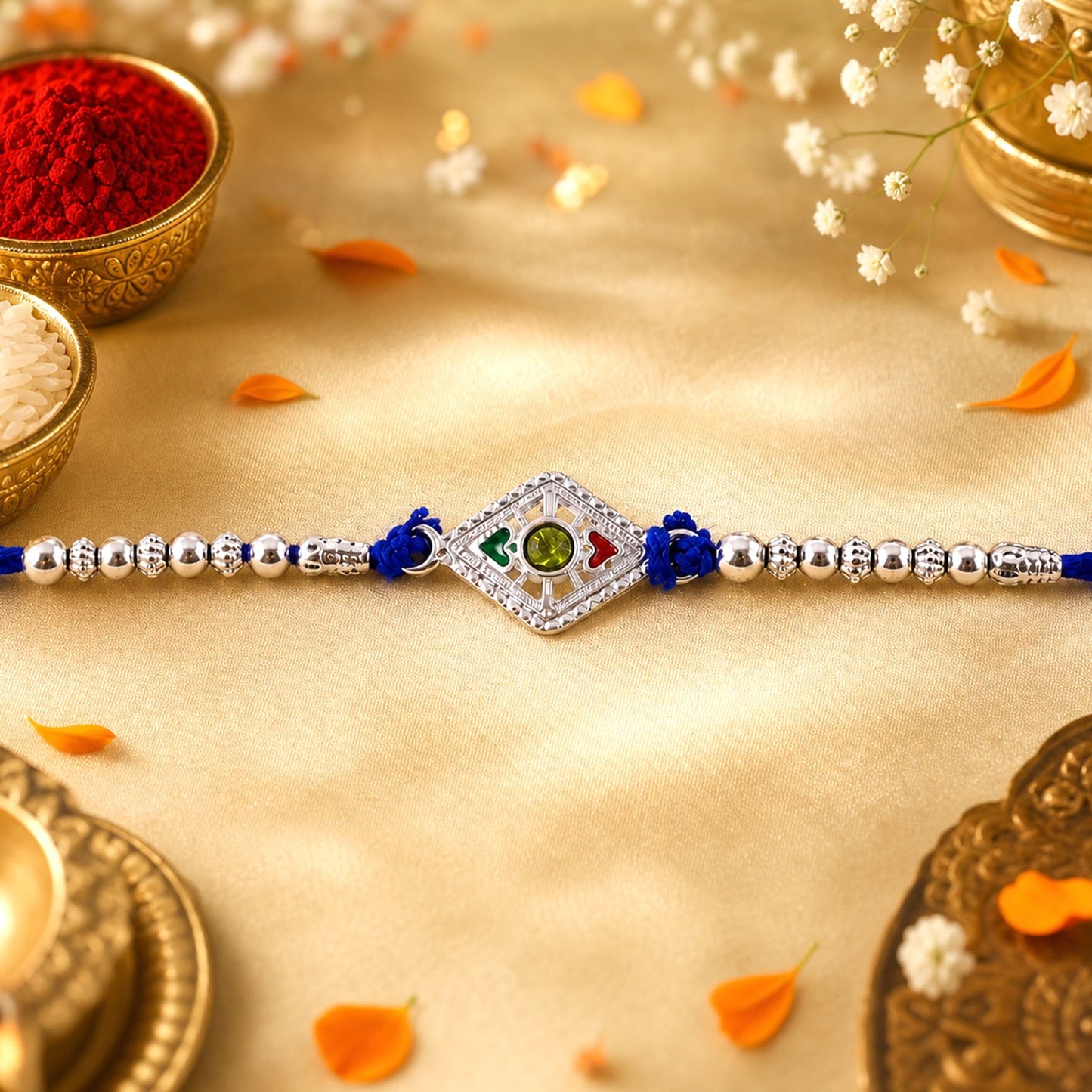 Silver Kite Rakhi with a sparkling stone charm and delicate beads, for Raksha Bandhan.