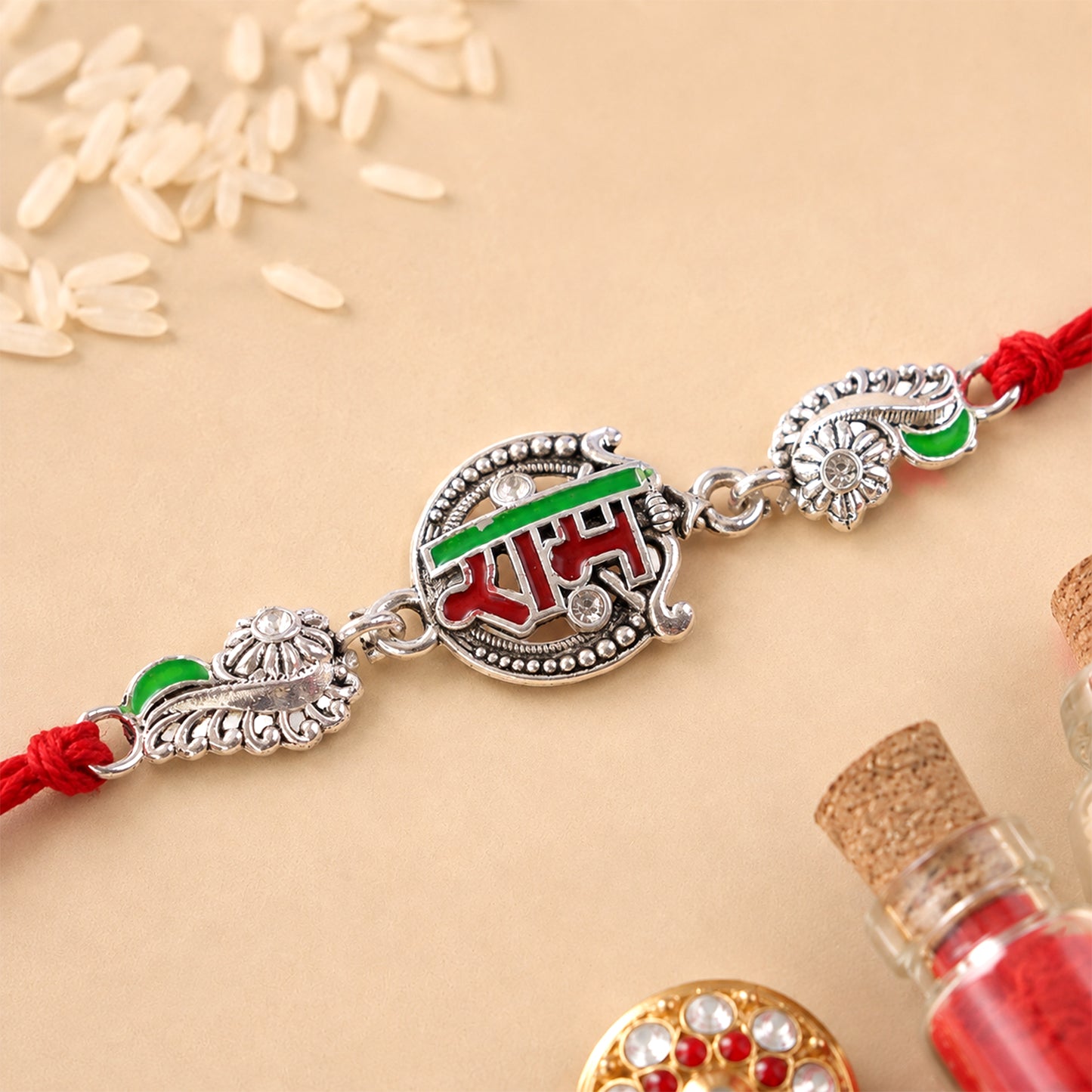 Silver-Toned Ram Rakhi with Red & Green Enamel and Crystal Accents for Brother