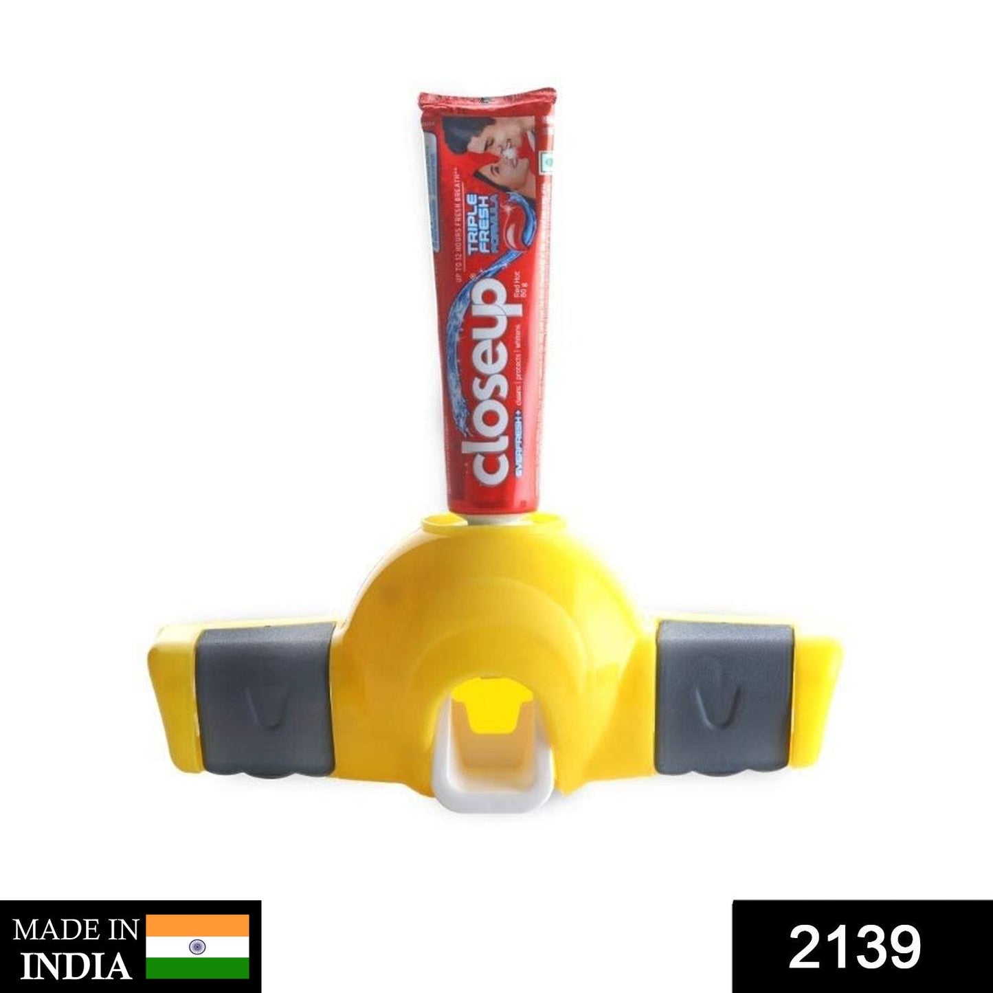 स्वचालित पुश टूथपेस्ट निचोड़ने वाला डिस्पेंसर