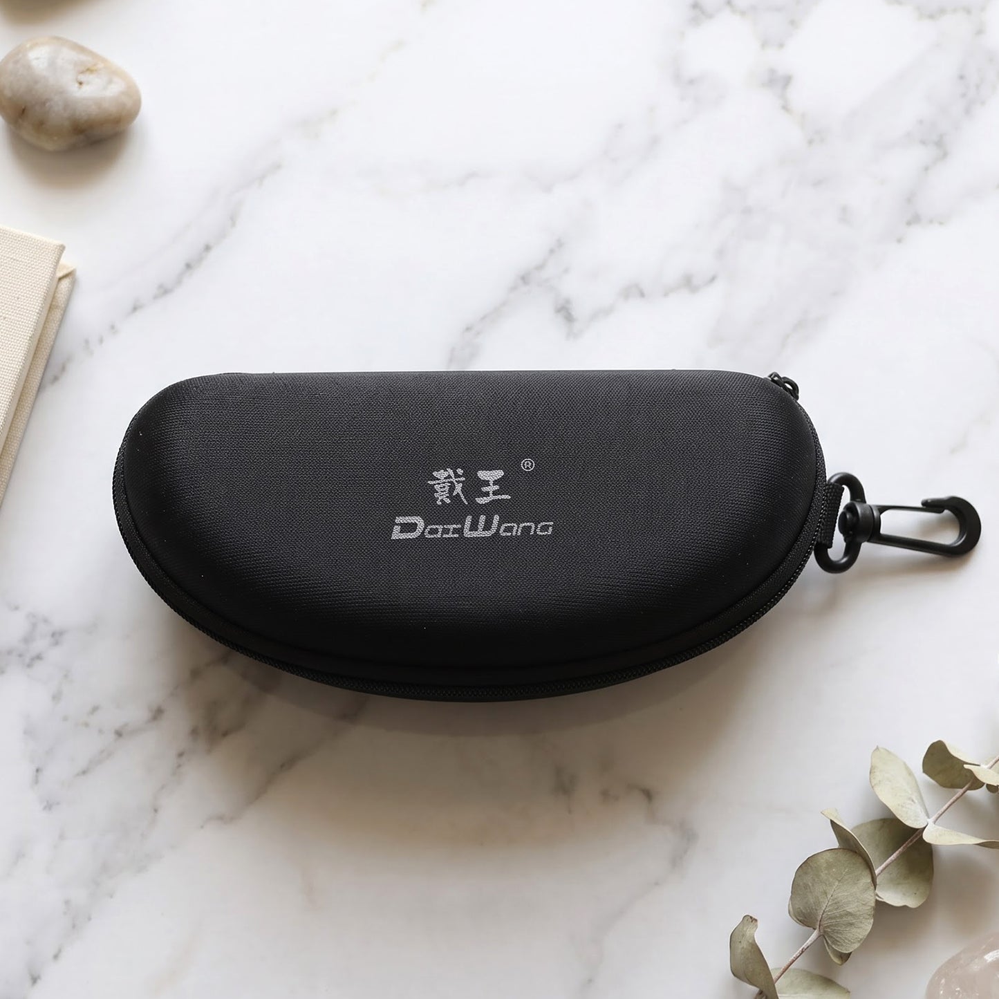 Sunglasses case on light background