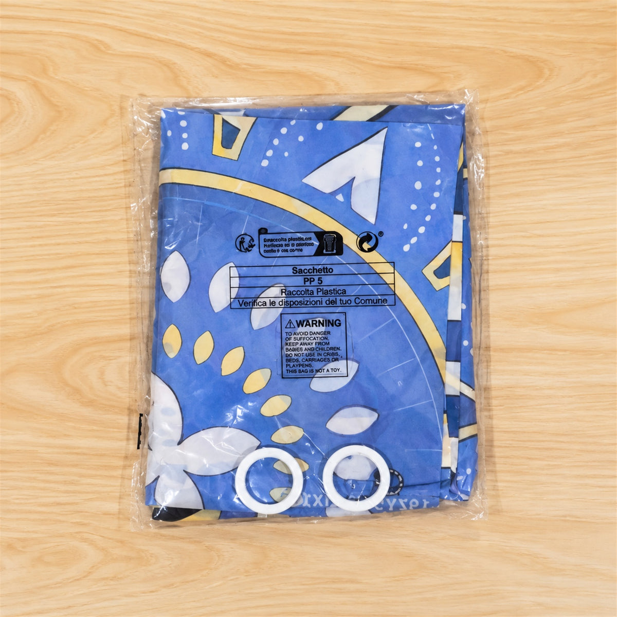 Actual photograph of Eid banner and accessories in plastic packaging