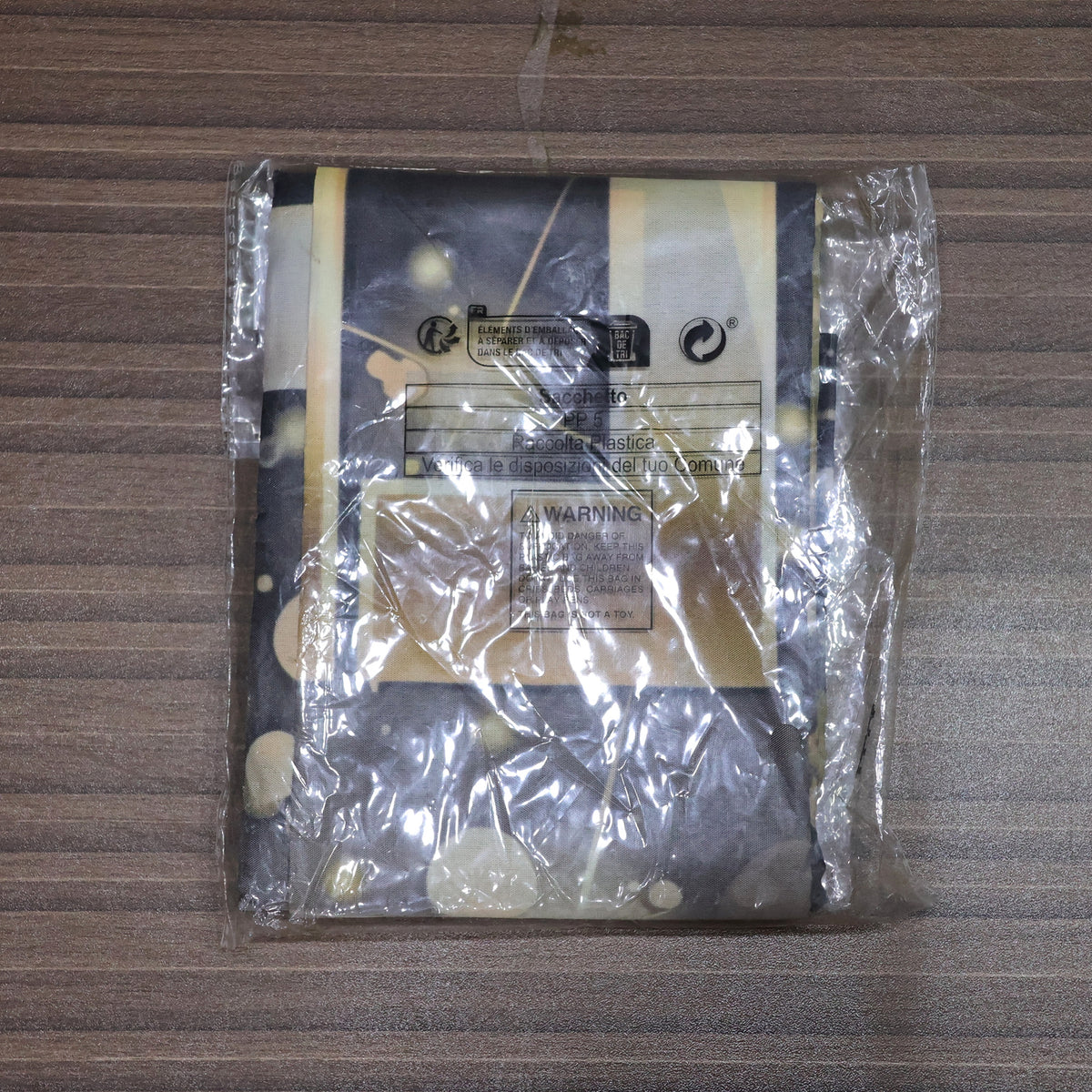 Actual folded backdrop in plastic packaging