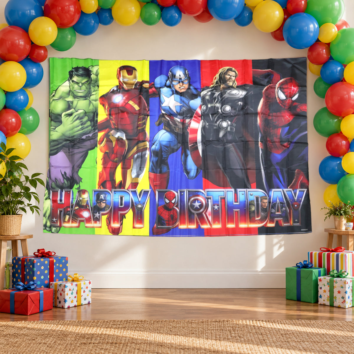 Superhero themed birthday banner on a party wall